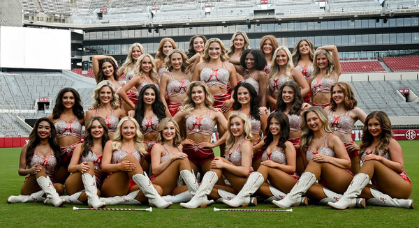 New boots on the field! Cullman family-owned business presents UA Crimsonettes with new gameday footwear